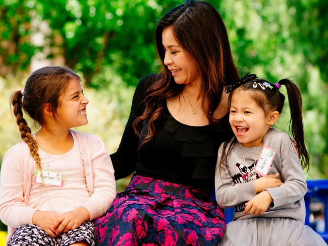 Teacher Mabellynne Buenaventura chats with Marissa Aouchan and Rosey Fuda during an orientation day at St Bernadette's Primary School in Lalor Park. Picture: Jonathan Ng