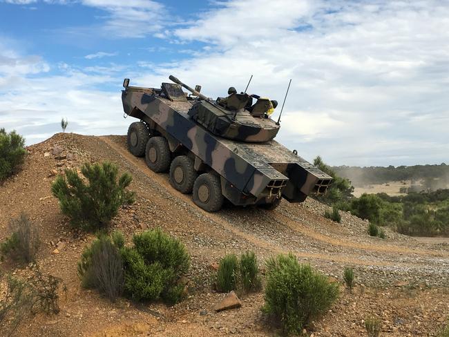 BAE Systems Australia’s AMV-35 defence vehicle tackles an obstacle course at Puckapunyal. Picture: Supplied
