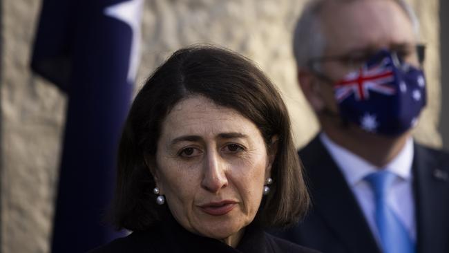 Gladys Berejiklian and Scott Morrison are battling tirelessly against Covid … but they are also cushioned from the worst of the effects of lockdowns. Picture: Getty Image