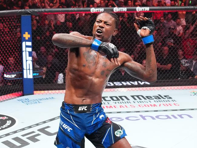 SALT LAKE CITY, UTAH - JULY 29: Kevin Holland celebrates his submission victory over Michael Chiesa in a welterweight fight during the UFC 291 event at Delta Center on July 29, 2023 in Salt Lake City, Utah. (Photo by Josh Hedges/Zuffa LLC via Getty Images)