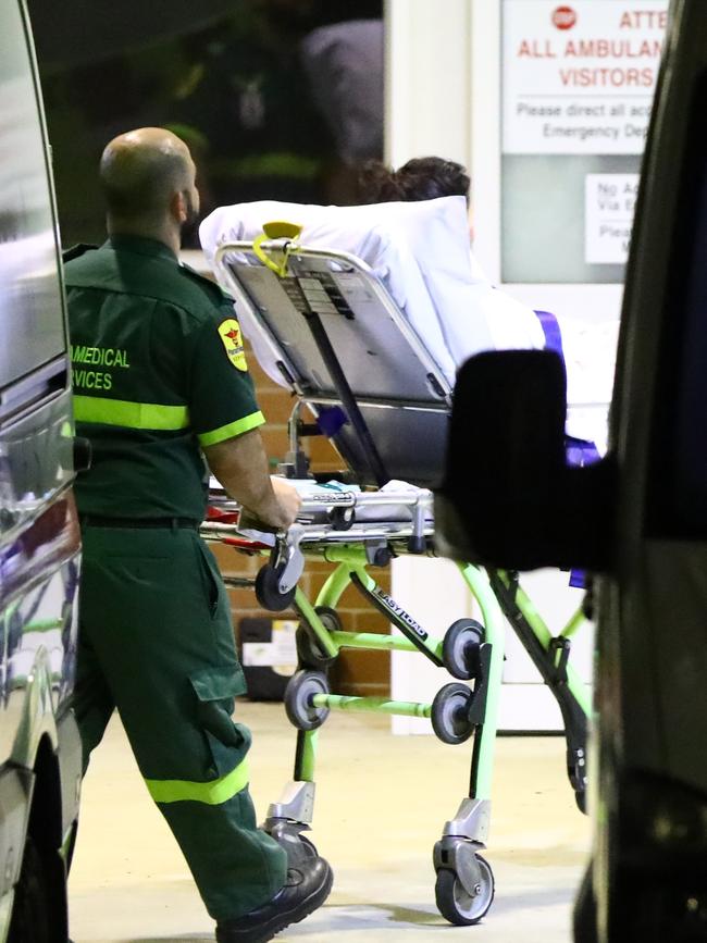 A victim of the White Island volcano eruption arrives at Concord Hospital for treatment with leading burns specialists. Picture: Matrix