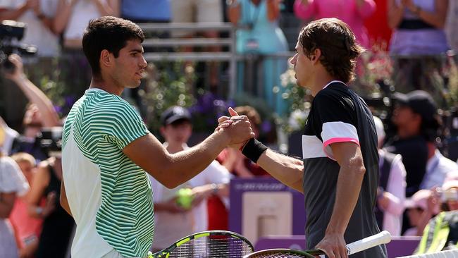 Carlos Alcaraz (left) and Alex de Minaur shake hands after the Queen’s Club final. Picture: Getty Images