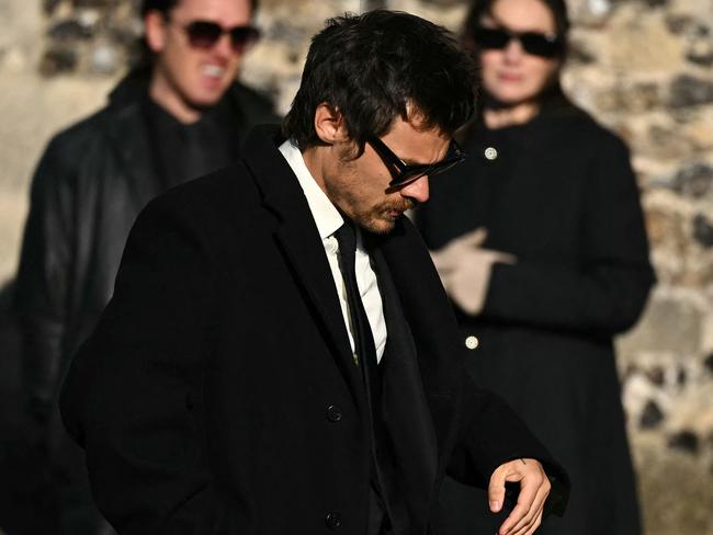 British singer Harry Styles arrives to attend the funeral service of the late One Direction singer Liam Payne, at a church in the Home Counties, to the west of London on November 20, 2024. Payne was found dead on October 16, 2024 after plunging from the balcony of his third-floor hotel room in Buenos Aires. (Photo by JUSTIN TALLIS / AFP)