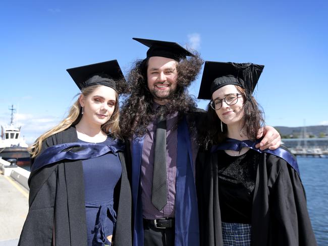 Bachelor of Arts graduate Ella Edwards, Diploma of Languages graduate Tyler Barron and Valedictorian and Bachelor of Arts graduate Emma Coad. Picture: PATRICK GEE