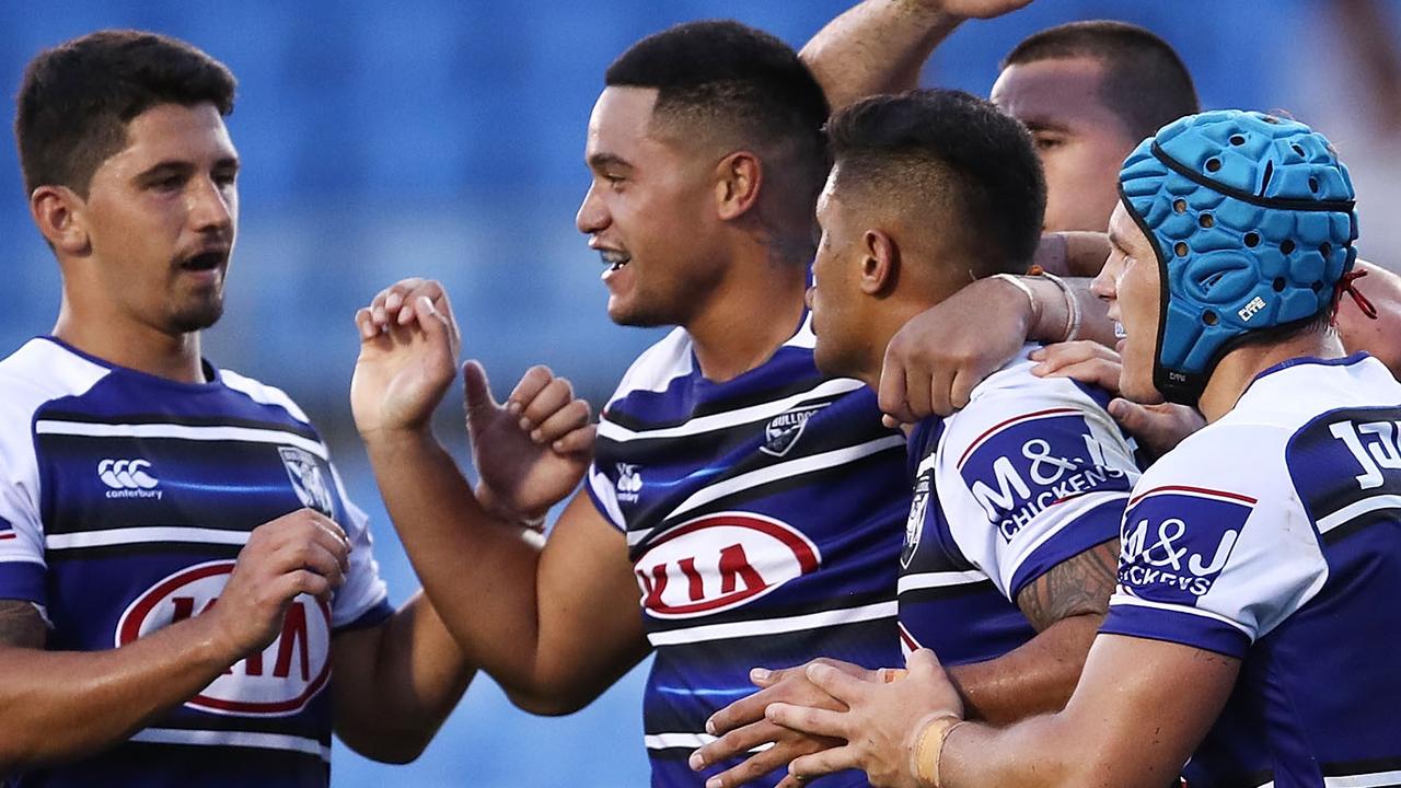 Fa'amanu Brown (centre) has not been offered a new Bulldogs deal.