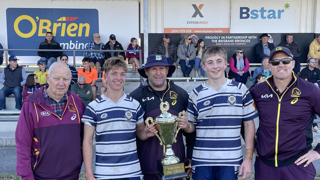 Phil Hall and Broncos champions Mick Hancock and Michael DeVere with the St Mary's captains after the DeVere grand final.