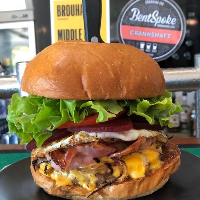 This Beardys burger features 150g Beef Patty, Double Bacon, Cheese, Grilled Onions, Grilled Pineapple, Fried Egg Beetroot, Tomato and Lettuce topped with their housemade Spicy BBQ sauce, Ketchup and Mustard.