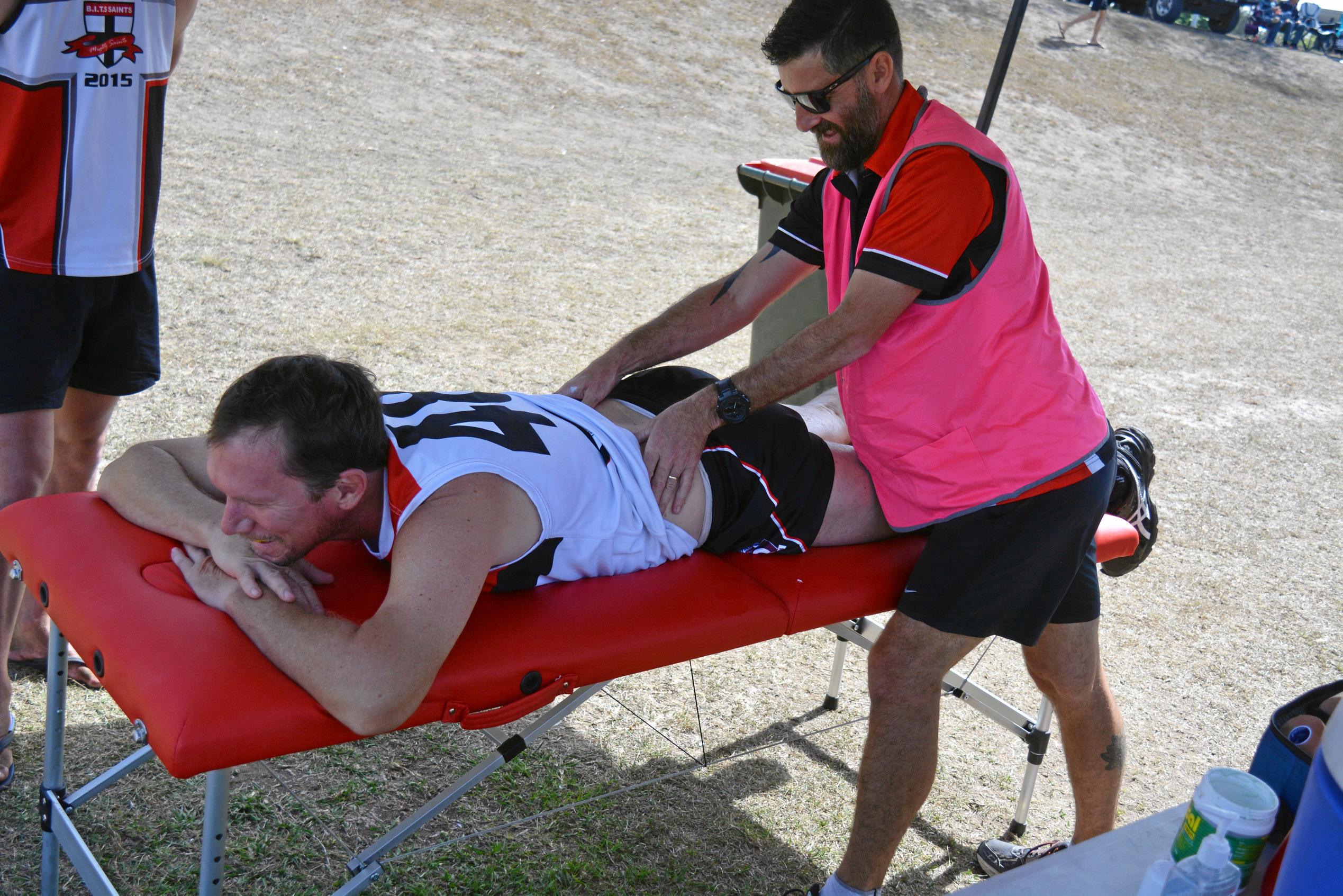 Damon Stebbings gets a rub down. Picture: Nick Kossatch GLA040819BITSBROS
