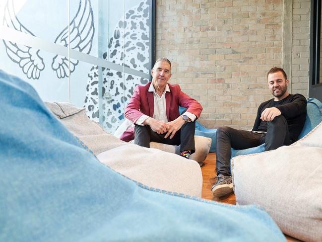 Geoff Harris, co-founder of Flight Centre, and on Tobi Skovron, founder Creative Cubes, pose for a portrait in the Hawthorn office space, Tuesday 17th September 2019. Geoff has invested money into Creative, which has a group of serviced offices and has plans to role the concept out across Melbourne and then around Australia in the future.  Picture Stefan Postles
