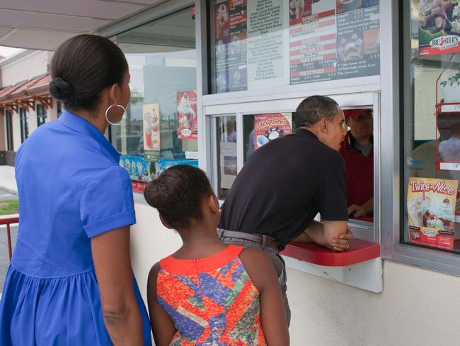 President Barack Obama, First Lady Michelle Obama, and daughter Sasha order ice cream at Bruster’s in Panama City Beach, Fla., Aug. 15, 2010. Picture: Official White House Photo by Pete Souza