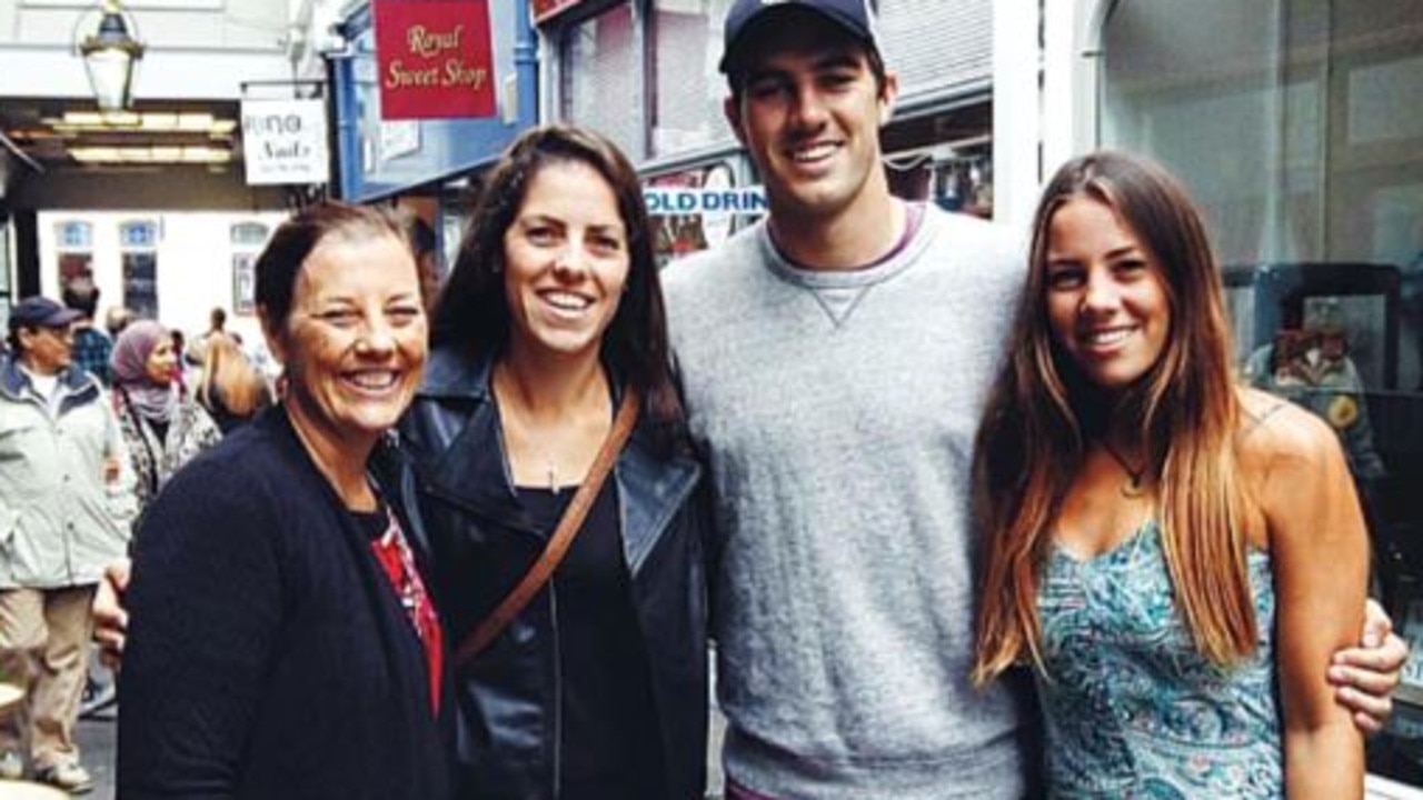 Pat Cummins alongside mother Maria (left) and sisters Kara and Laura.