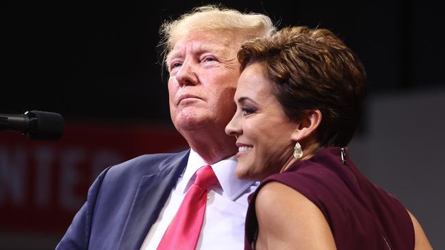 Donald Trump embraces Republican candidate for governor Kari Lake in Prescott Valley, Arizona.