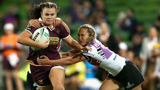 Amber Pilley on the charge for the Broncos. Picture: Getty Images