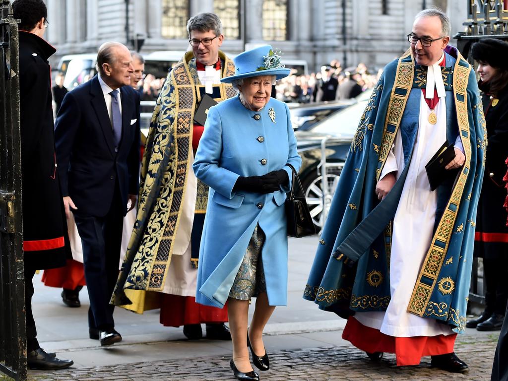 Queen Elizabeth II and Prince Philip, Duke of Edinburgh are escorted by Dean of Westminster Dr John Hall as they attend the Commonwealth Observance Day Service on March 14, 2016 in London, United Kingdom. Picture: Getty