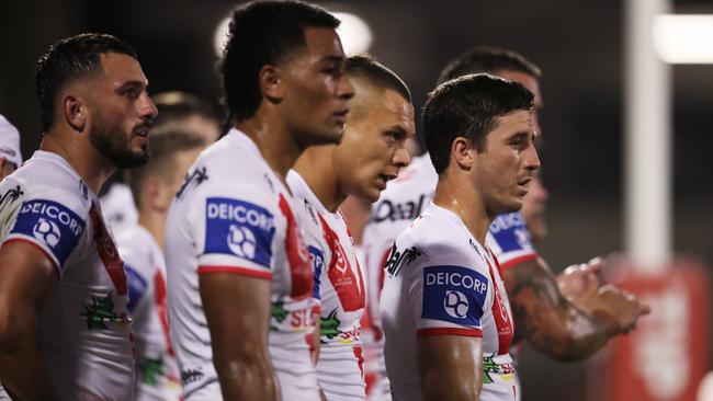 WOLLONGONG, AUSTRALIA - MAY 02:  Ben Hunt of the Dragons looks dejected with team mates after a Tigers try during the round eight NRL match between the St George Illawarra Dragons and the Wests Tigers at WIN Stadium, on May 02, 2021, in Wollongong, Australia. (Photo by Matt King/Getty Images)