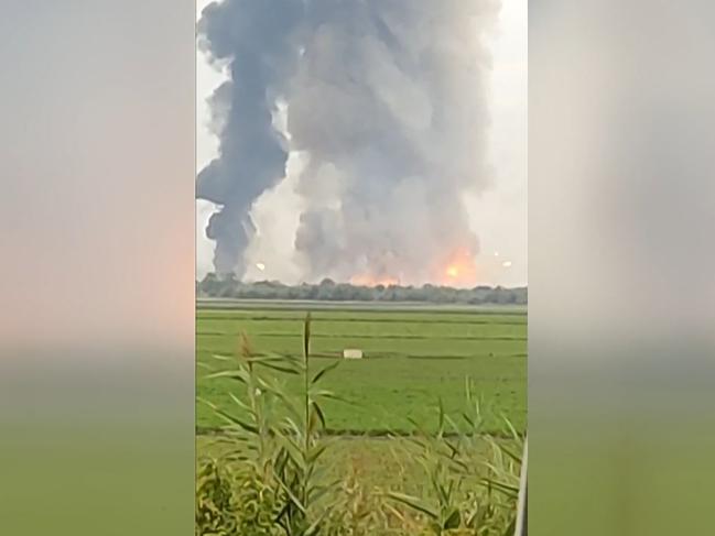 The burning munitions depot in Crimea early on August 16, 2022. Picture: Marie-Laure Messana/ESN/AFP