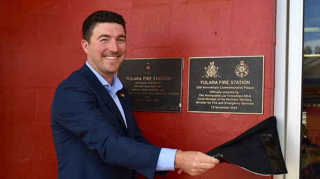 Braitling MLA Josh Burgoyne unveils a plaque to commemorate the 25th anniversary of Yulura Fire Station. Picture: Supplied