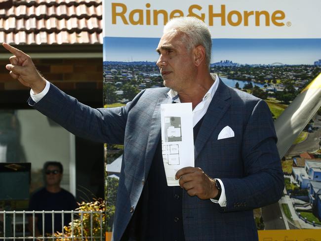 Tom Panos in his role as auctioneer. Picture: John Appleyard