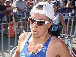 Emma Snowsill heads for victory in the 2008 Noosa Triathlon. Picture: CADE MOONEY