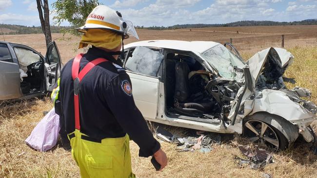 A firefighter inspect the wreckage. Photo: Frances Klein