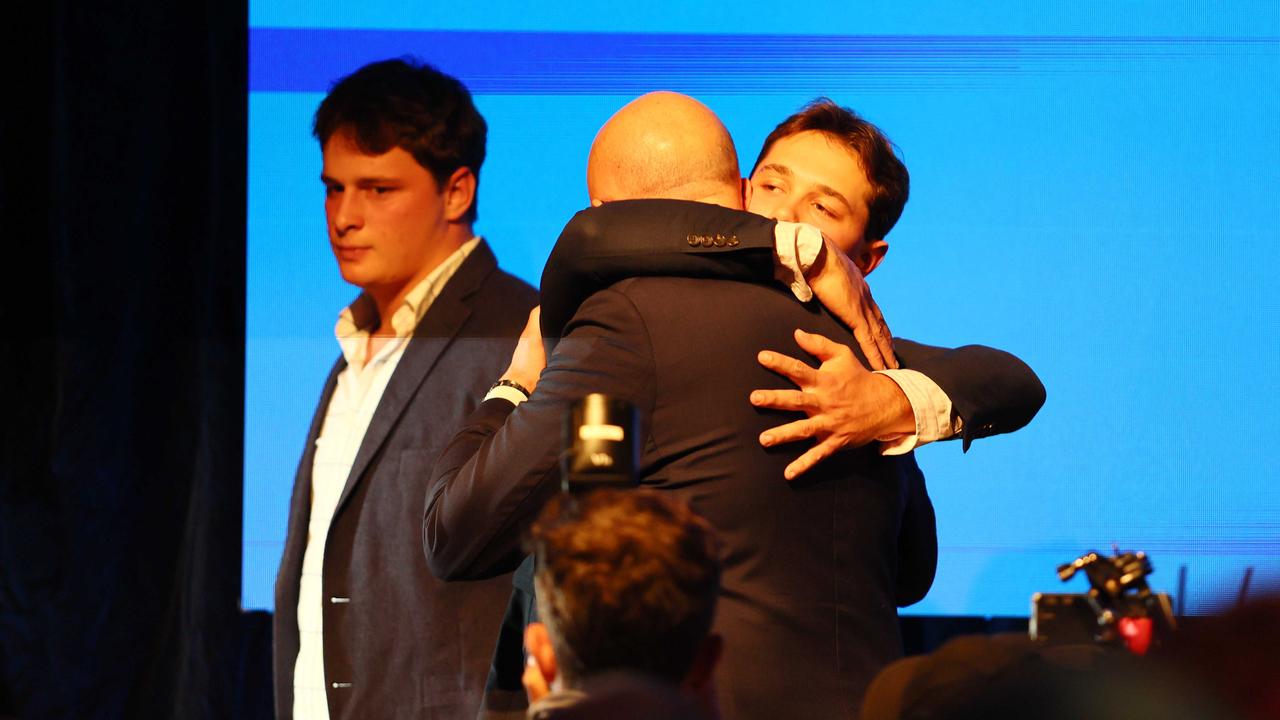 Peter Dutton is hugged by one of his after conceding the election and his own seat. Picture: NewsWire/Tertius Pickard