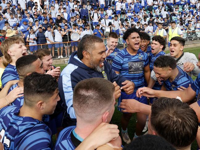 Patrician Brothers coach Frank Pritchard celebrating winning the NRL Schoolboys Grand Final against Hills Sports High last year. Picture: Jonathan Ng