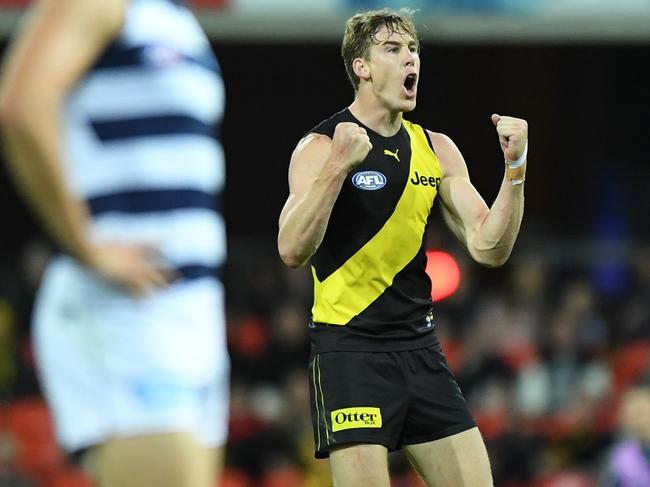 GOLD COAST, AUSTRALIA - SEPTEMBER 11: Tom J. Lynch of the Tigers celebrates kicking a goal during the round 17 AFL match between the Geelong Cats and the Richmond Tigers at Metricon Stadium on September 11, 2020 in Gold Coast, Australia. (Photo by Matt Roberts/AFL Photos/via Getty Images)