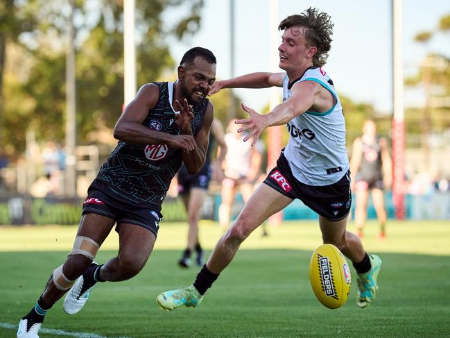 Will Lorenz puts Willie Rioli under pressure during Port’s internal trial last summer. Picture: Matt Loxton