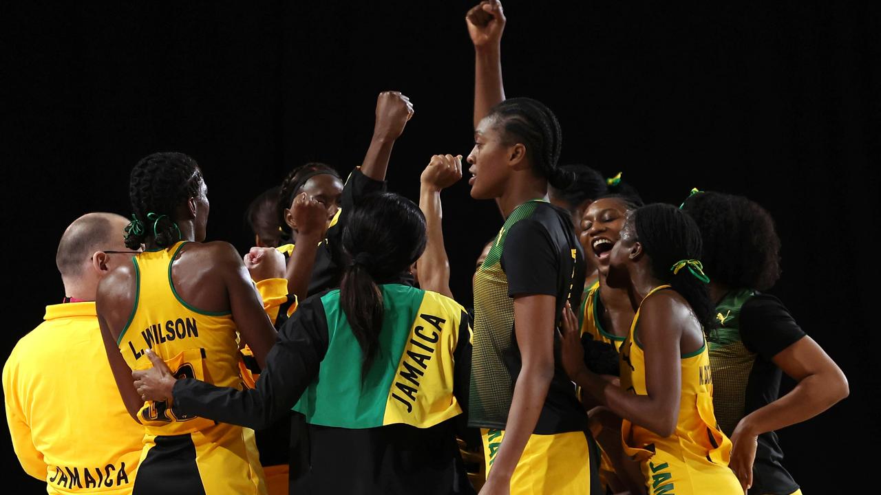 Team Jamaica celebrate winning the match against Australia