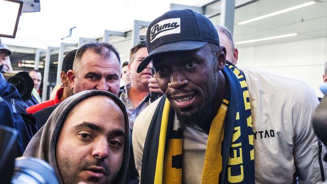 Usain Bolt poses in Sydney on arriving for training with the Central Coast Mariners. Picture: Jenny Evans