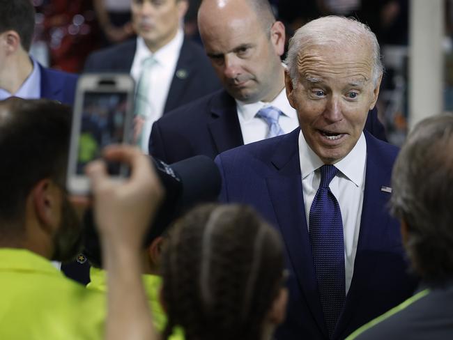 HAGERSTOWN, MARYLAND - OCTOBER 07: U.S. President Joe Biden greets employees and guests at Volvo Group Powertrain after delivering remarks about the economy on October 07, 2022 in Hagerstown, Maryland. Biden highlighted his administration's efforts on "building the economy from the bottom up and middle out." According to the company, about 1,700 employees at the Maryland plant develop and manufacture heavy-duty diesel engines, transmissions and axles for Mack Trucks, Volvo trucks and buses and Prevost coaches.   Chip Somodevilla/Getty Images/AFP