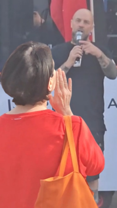 Tensions rise: National Workers Alliance member confronts Labor volunteer