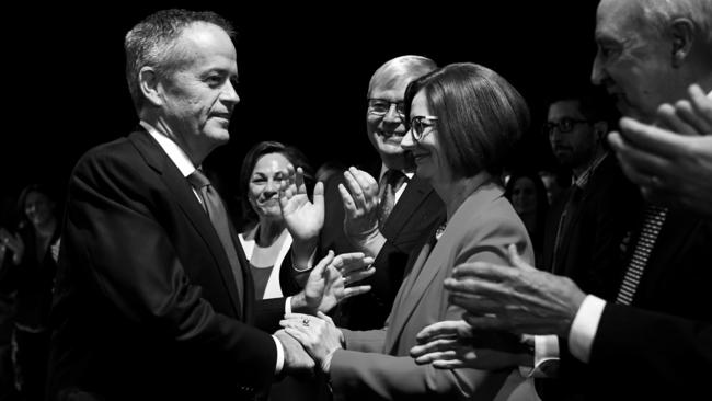 Australian Opposition Leader Bill Shorten (left) is welcomed by former Australian Prime Ministers Kevin Ruff, Julia Gillard and Paul Keating as he arrives at the Labor Party campaign launch for the 2019 Federal election at the Brisbane Convention Centre in Brisbane, Sunday, May 5, 2019. A Federal election will be held in Australian on Saturday May 18, 2019. (AAP Image/Lukas Coch) NO ARCHIVING