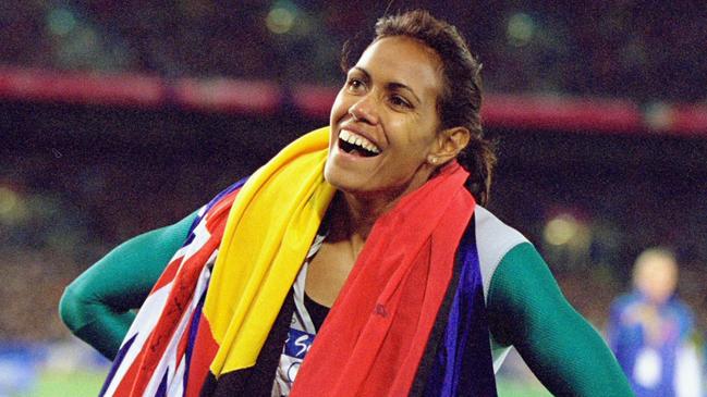 Cathy Freeman after winning the 400m at the Sydney Olympics. Picture: Nick Wilson