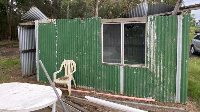 The crime scene where a number of bullets smashed through a window of a disused shed sitting just metres from a residence at Wyee Creek. Picture: supplied