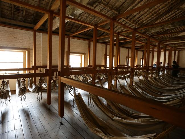 Historically accurate versions of the hammocks that would have been used by convicts in colonial times on display at Hyde Park Barracks.