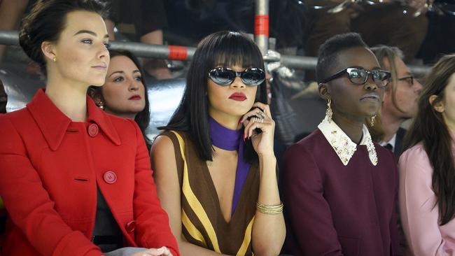 PARIS, FRANCE - MARCH 05: Actress Margot Robbie, Rihanna and actress Lupita Nyong'o attend the Miu Miu show as part of the Paris Fashion Week Womenswear Fall/Winter 2014-2015 on March 5, 2014 in Paris, France. (Photo by Pascal Le Segretain/Getty Images)