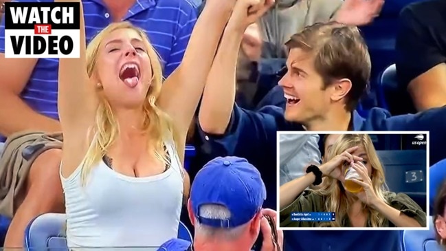 World falls in love with beer girl at US Open