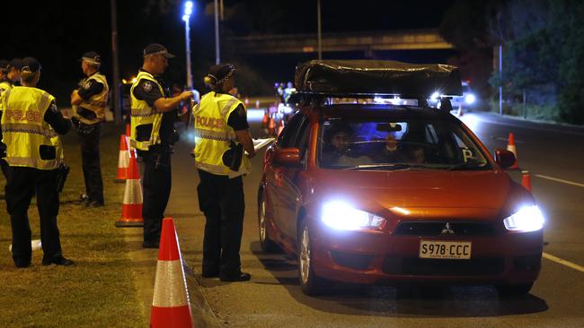 Police stop a car on the Gold Coast Highway at Coolangatta overnight. Picture: Regi Varghese/AAP