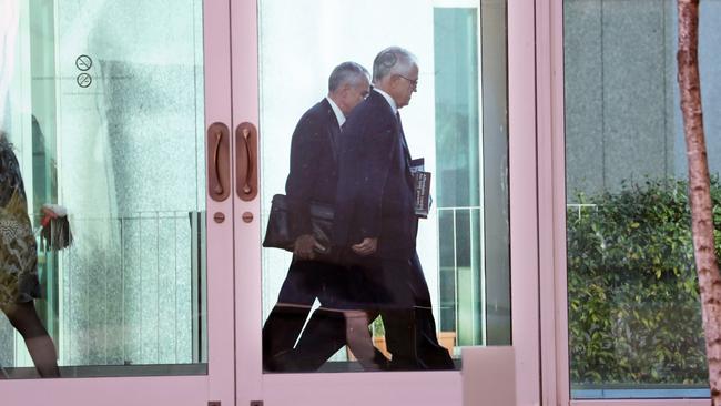 The Prime Minister Malcolm Turnbull on his way to the party room meeting in Parliament House in Canberra.