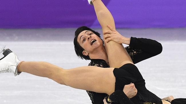 Canada's Scott Moir and Canada's Tessa Virtue compete in the figure skating team event.