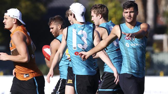 Riley Bonner (right) has signed a two-year contract extension at Port Adelaide along with Dougal Howard. Picture: Sarah Reed