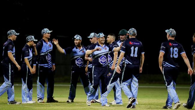 Barrier Reef Big Bash Game 1: Badgers v Hurricanes at Griffiths Park. Hurricanes celebrate taking a wicket. Picture: Stewart McLean