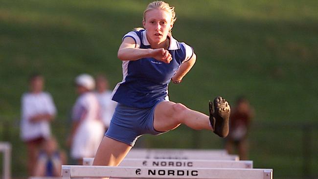 Yr 9 Helensvale High School student Sally McLellan (14), U20 100m title winner at in 2001. Picture: Adam Ward.