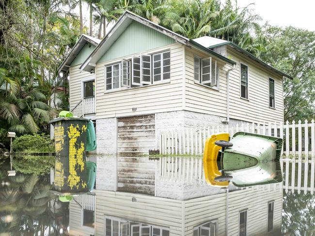 Thursday 31st March 2022Mirrored reflections on the still flood waters this morning with loads of rubbish surrounding Lismore Suburbs today PictureÃs Darren Leigh Roberts