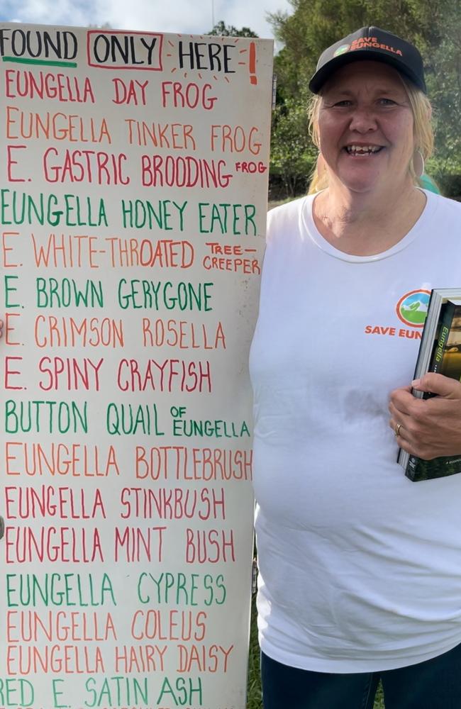 Mandy Tenant from Crediton, a leader in the Save Eungella movement who had previously protested at a Town Hall with Premier Steven Miles, joined her committee on the banks of the Pioneer to make their voices heard to the Prime Minister. Photo: Fergus Gregg