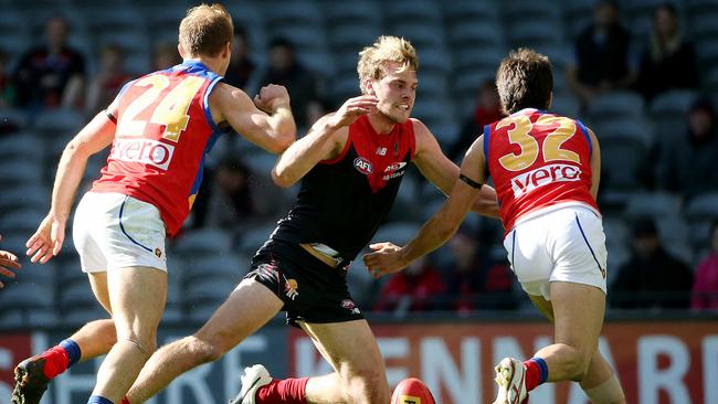 Jack Watts applied a tackle on Sam Mayes. Picture: Colleen Petch