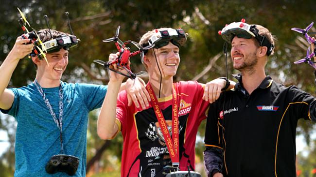 Top drone racers Darcy Rose’Meyer, 15, Angus Porter, 15, and Kris Mallise, 31. Picture: Dean Martin