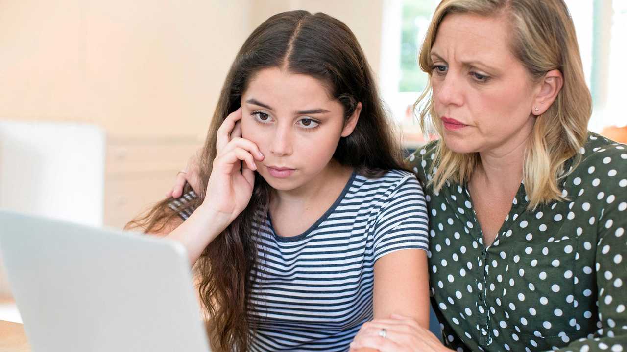 Have discussions with your children about what they are listening to and looking at online to help them establish boundaries. Picture: iStock