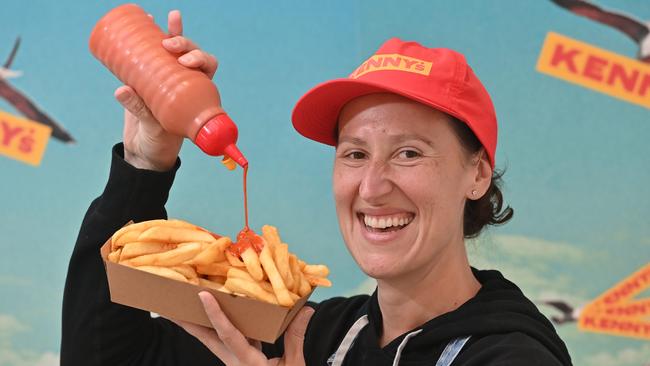 Kenny’s co-owner Kristina Noicos with the house speciality, fresh-cut hot chips. Picture: Keryn Stevens